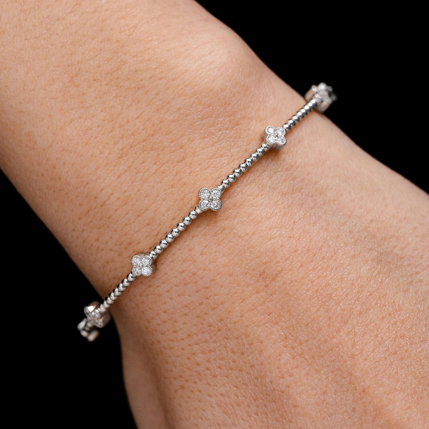 Milgrain Clover Diamond Flex Bangle Bracelet in 14K white gold, 0.45ctw, detail view