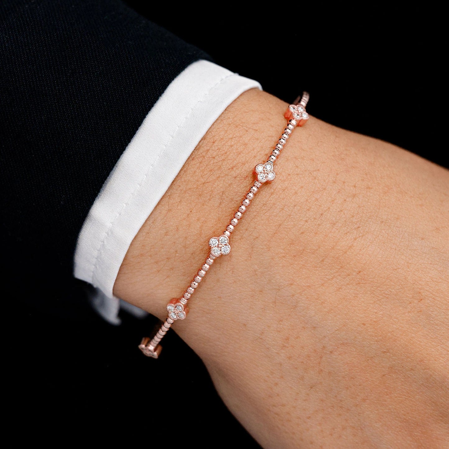 Milgrain Clover Diamond Flex Bangle Bracelet in 14K rose gold, 0.33ctw, detail view