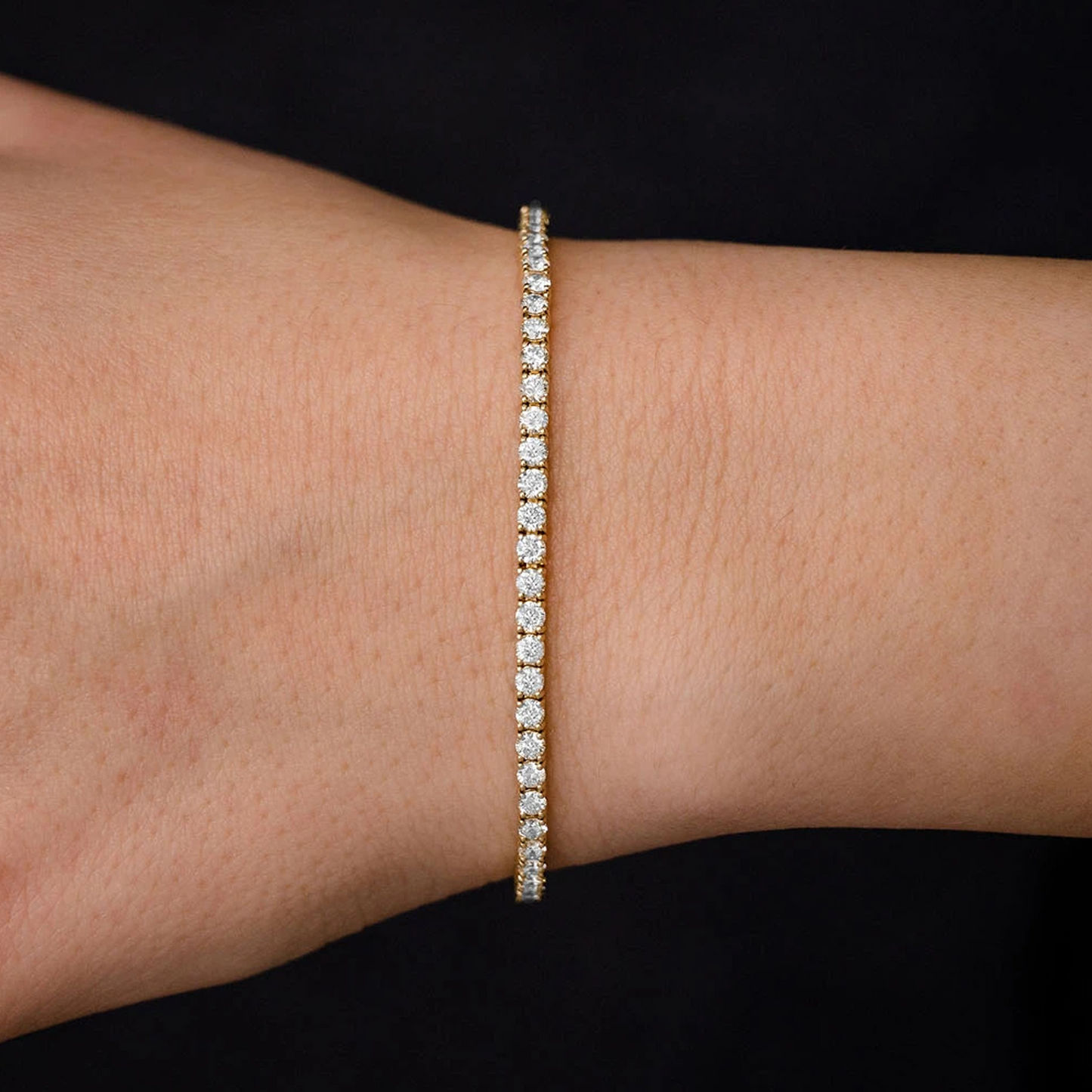 Prong Diamond Tennis Bracelet in 14K yellow gold, 6pt / 4.60ctw, worn view