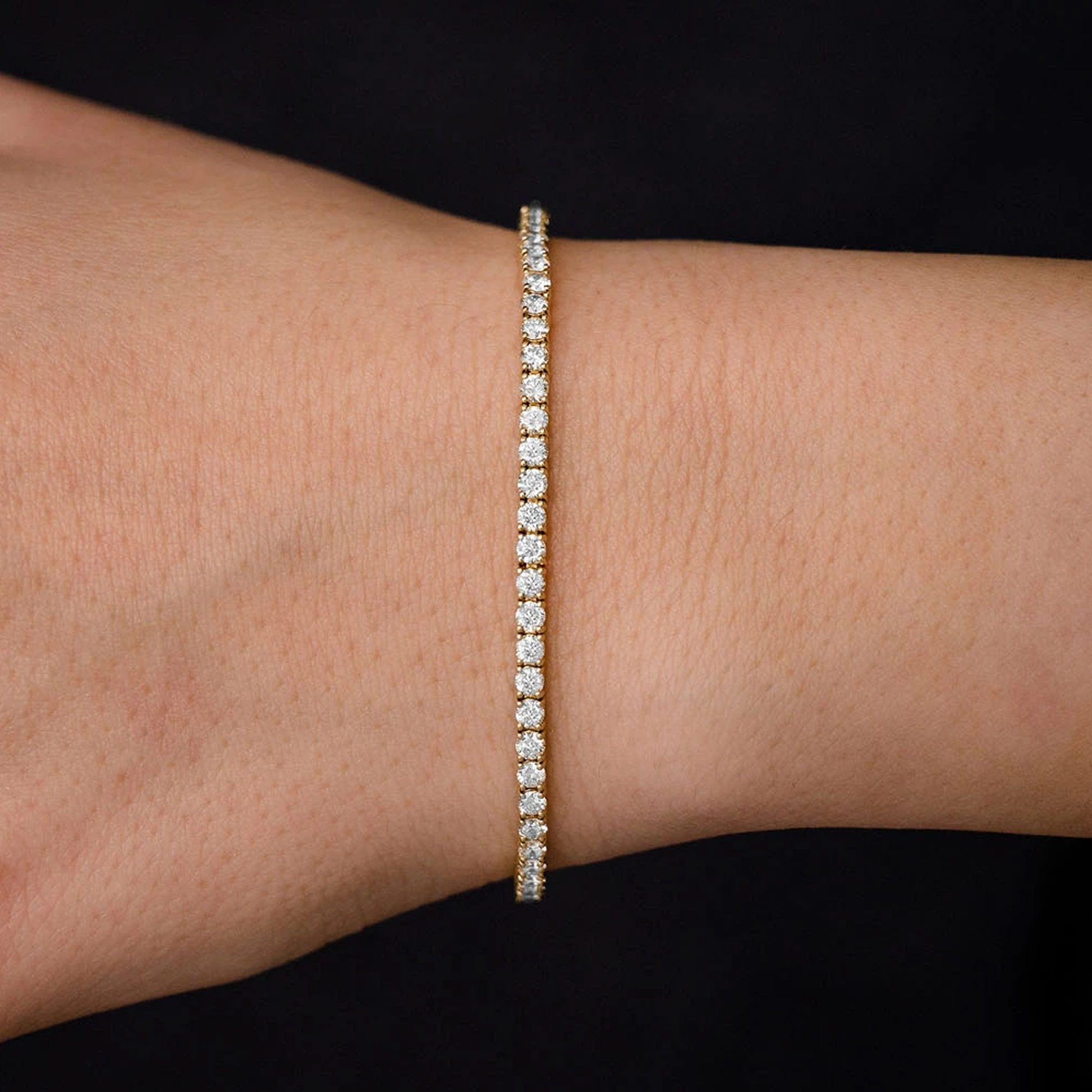 Prong Diamond Tennis Bracelet in 14K yellow gold, 6pt / 4.60ctw, worn view