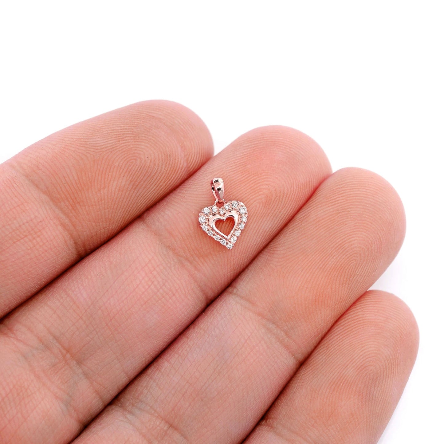 Open Heart Halo Diamond Pendant in 14K rose gold, angled view