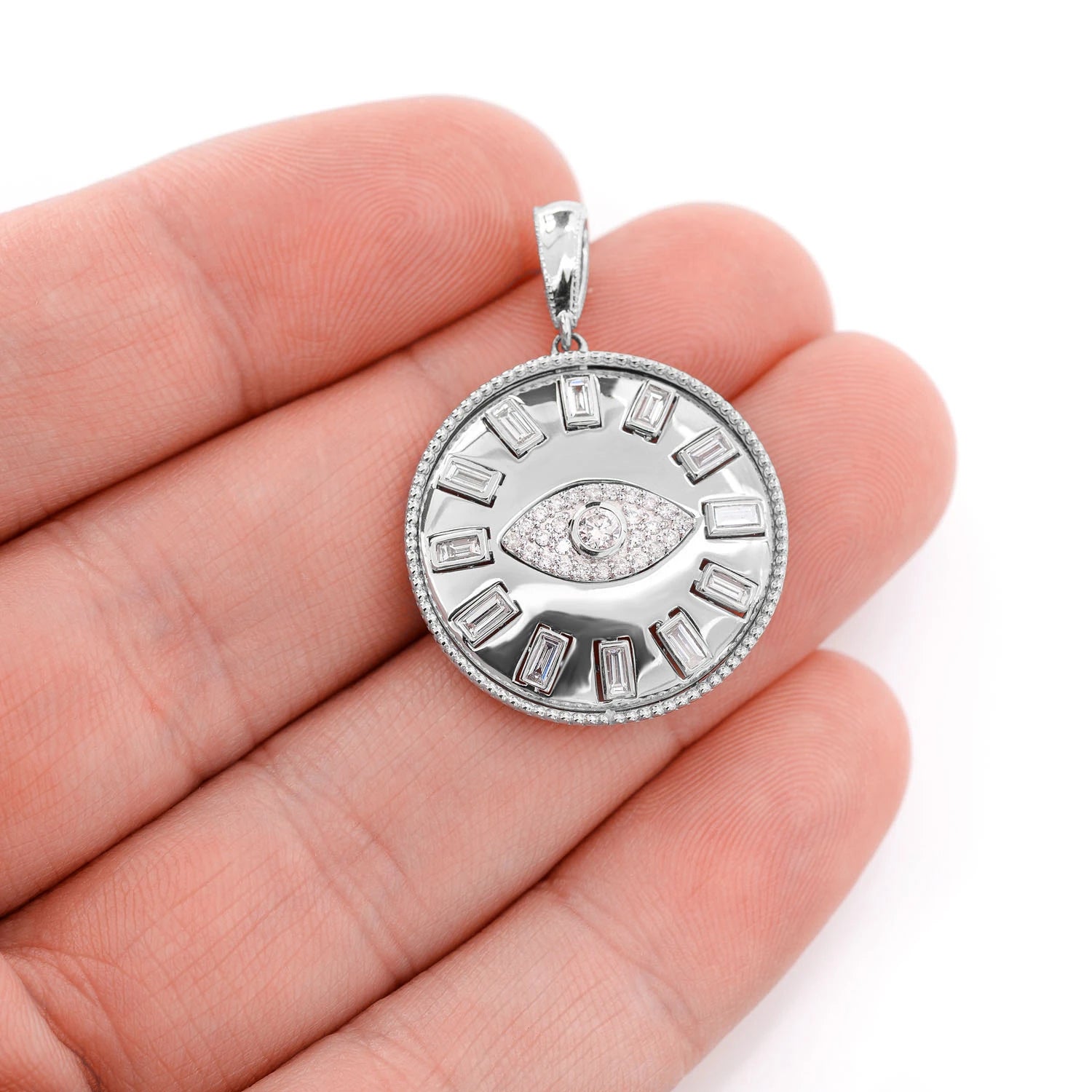 Evil Eye Baguette Diamond Medallion Pendant in 14K white gold, angled view