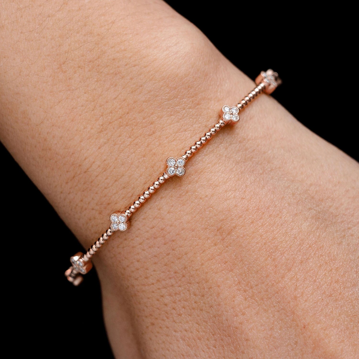 Milgrain Clover Diamond Flex Bangle Bracelet in 14K rose gold, 0.45ctw, detail view