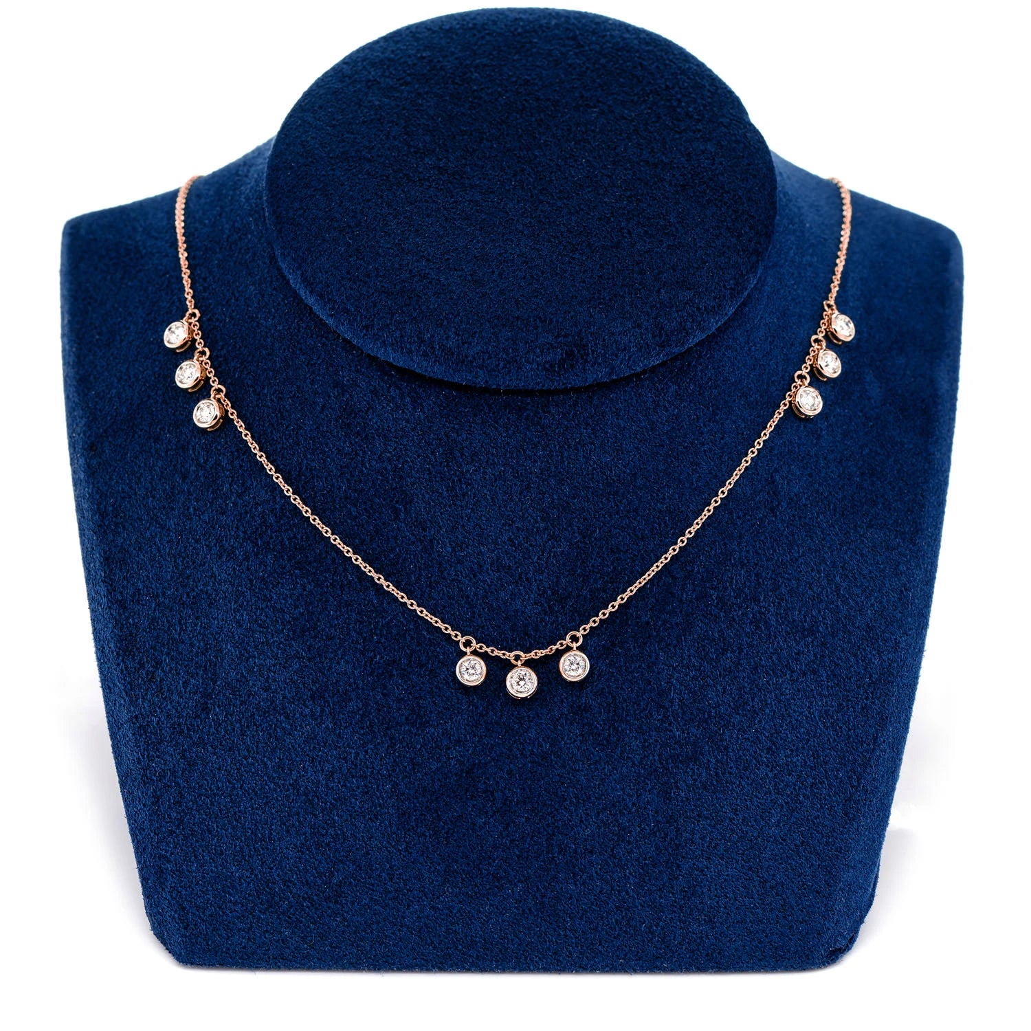Triple Bezel Diamond Drop Station Necklace in 14K rose gold, angled view