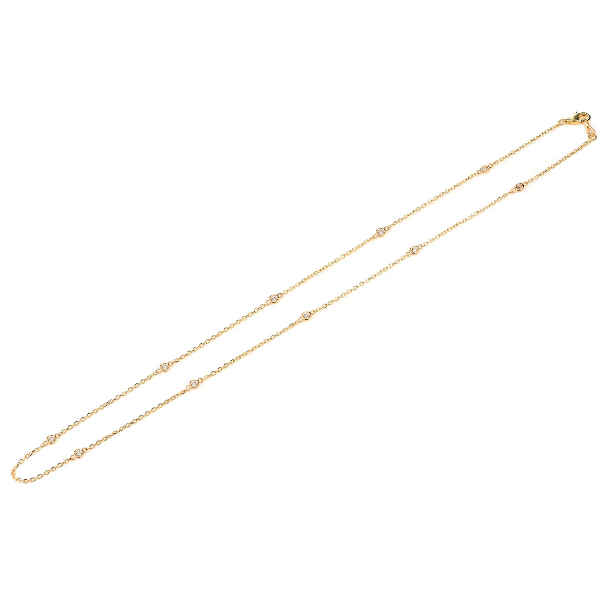 Ten Bezel Diamond Station Necklace in 14K yellow gold, detail view