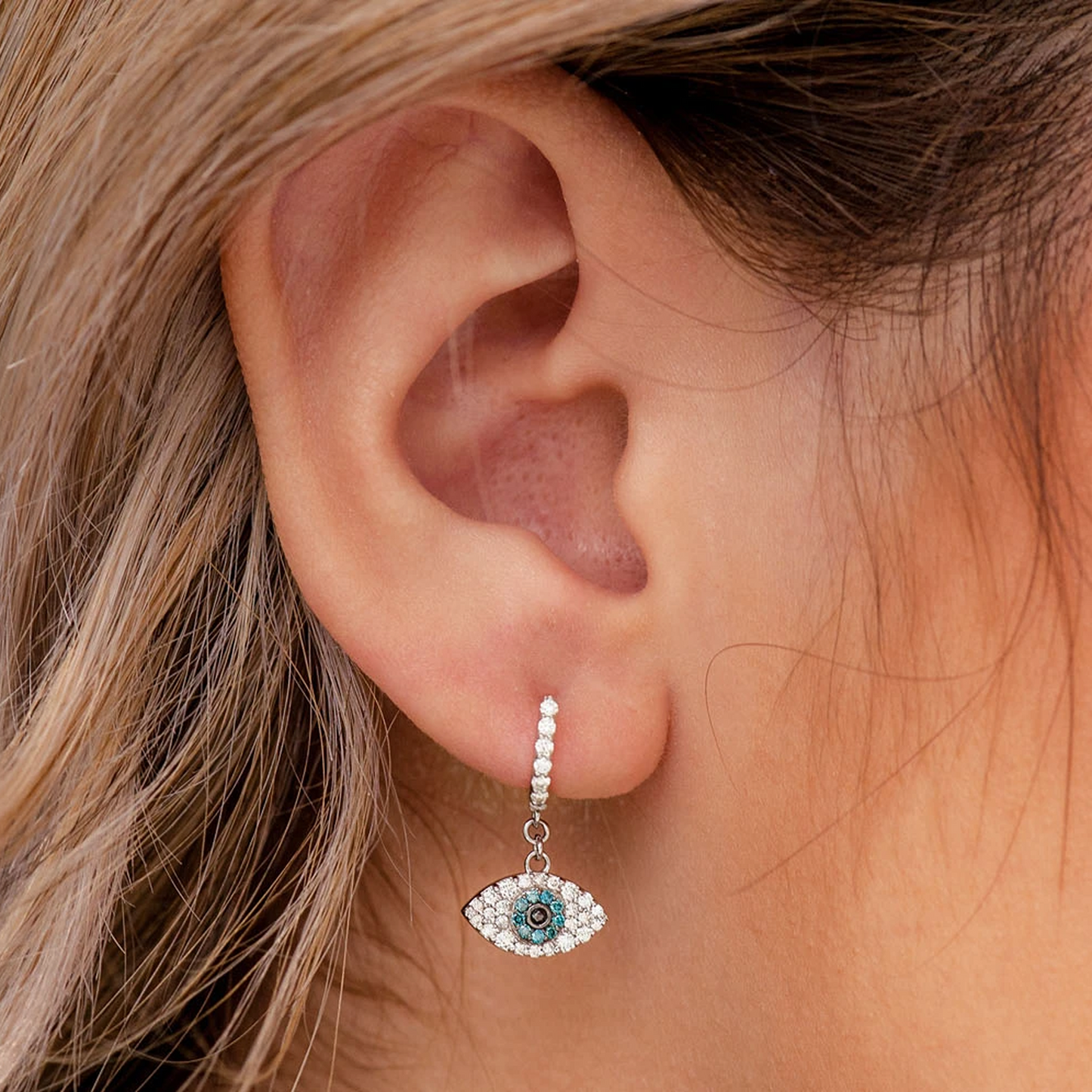 Evil Eye Diamond Hoop Drops in 14K white gold, angled view