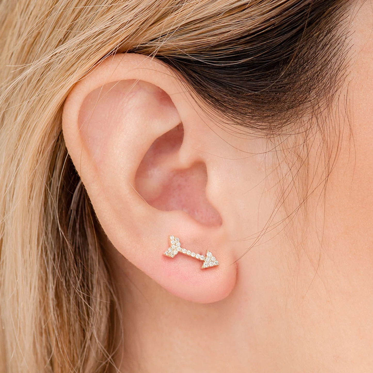 Arrow Diamond Stud Earrings in 14K yellow gold, angled view