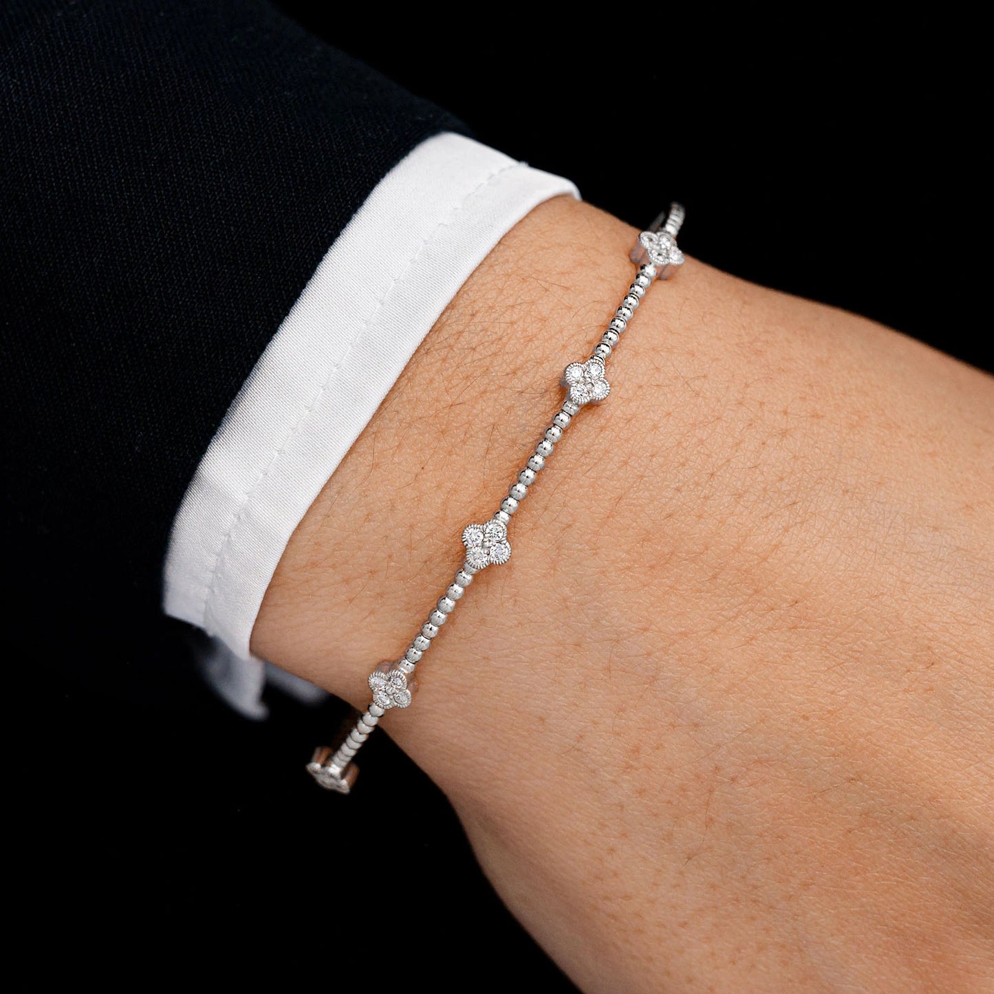 Milgrain Clover Diamond Flex Bangle Bracelet in 14K white gold, 0.33ctw, detail view