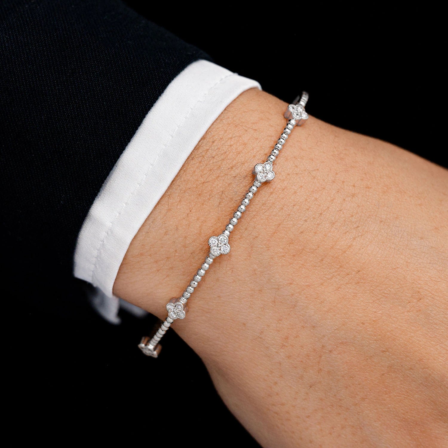 Milgrain Clover Diamond Flex Bangle Bracelet in 14K white gold, 0.33ctw, detail view
