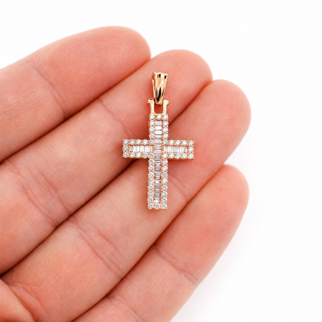 Baguette Halo Diamond Cross Pendant in 14K rose gold, in hand