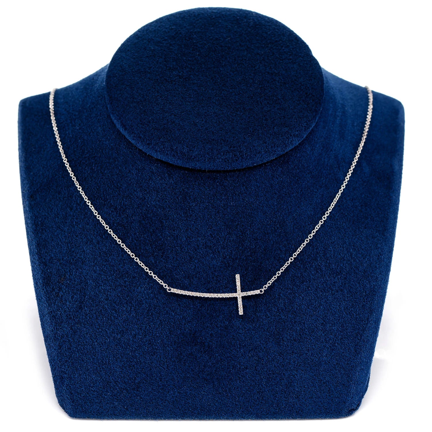 Curved Sideways Diamond Cross Necklace in 14K white gold, angled view