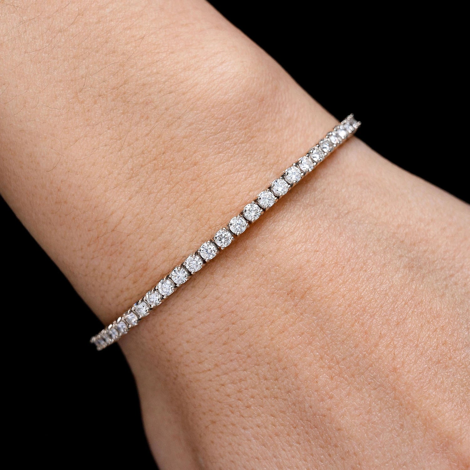 Prong Diamond Flex Bangle in 14K white gold, 7pt / 2.00ctw, angled view