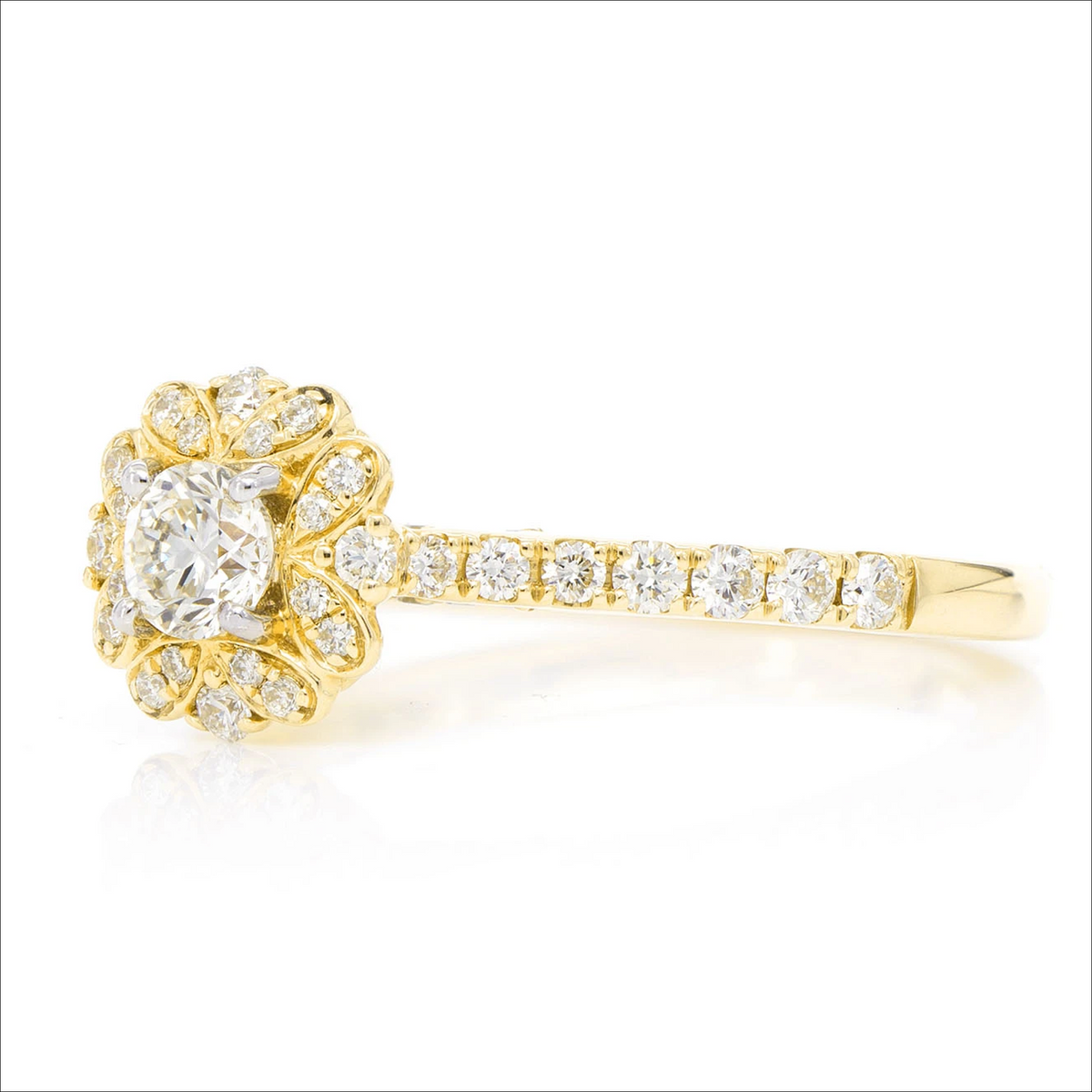 Round floral halo ring in 14K yellow gold, side view