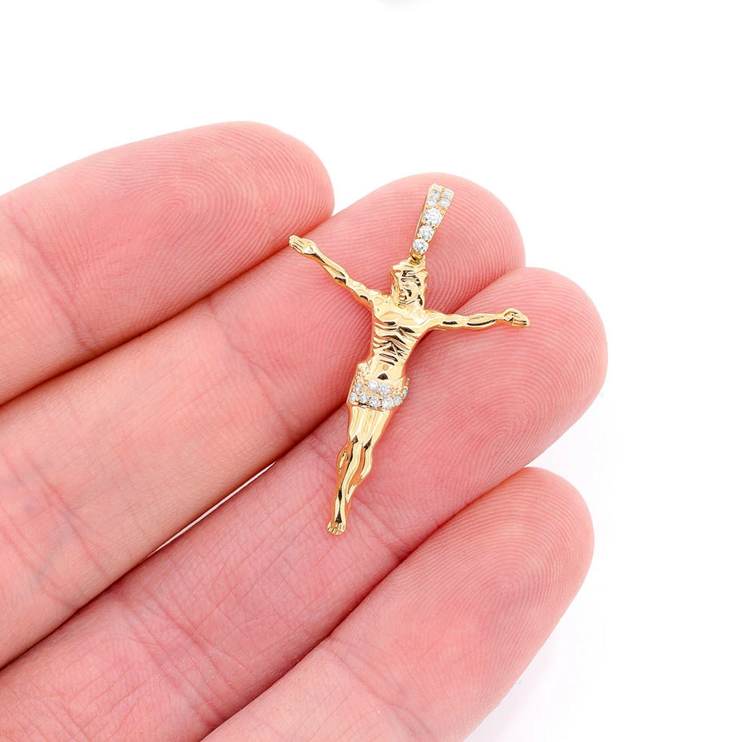 Jesus Crucifix Diamond Pendant in 14K yellow gold, Signature | 0.10ctw | Half-Diamond, angled view