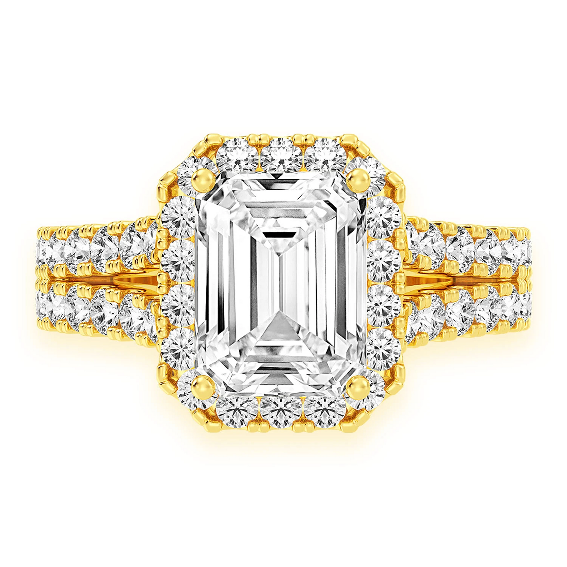 Sphinx Emerald Halo Ring in 14K yellow gold, front view
