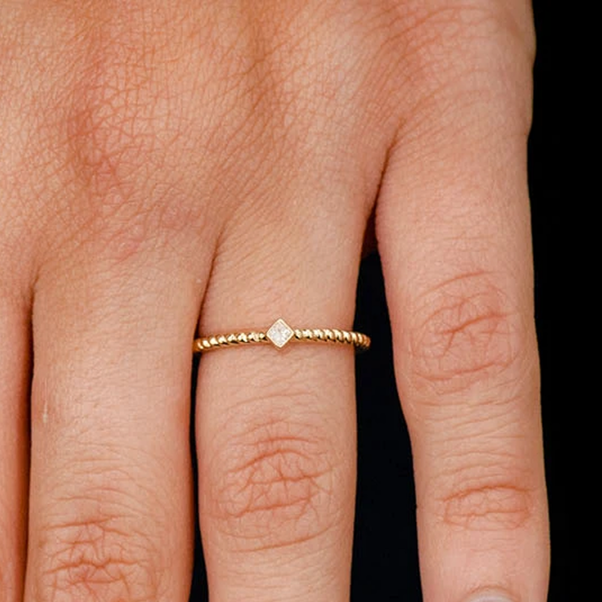 Princess Rope Bezel Diamond Ring in 14K yellow gold, worn view