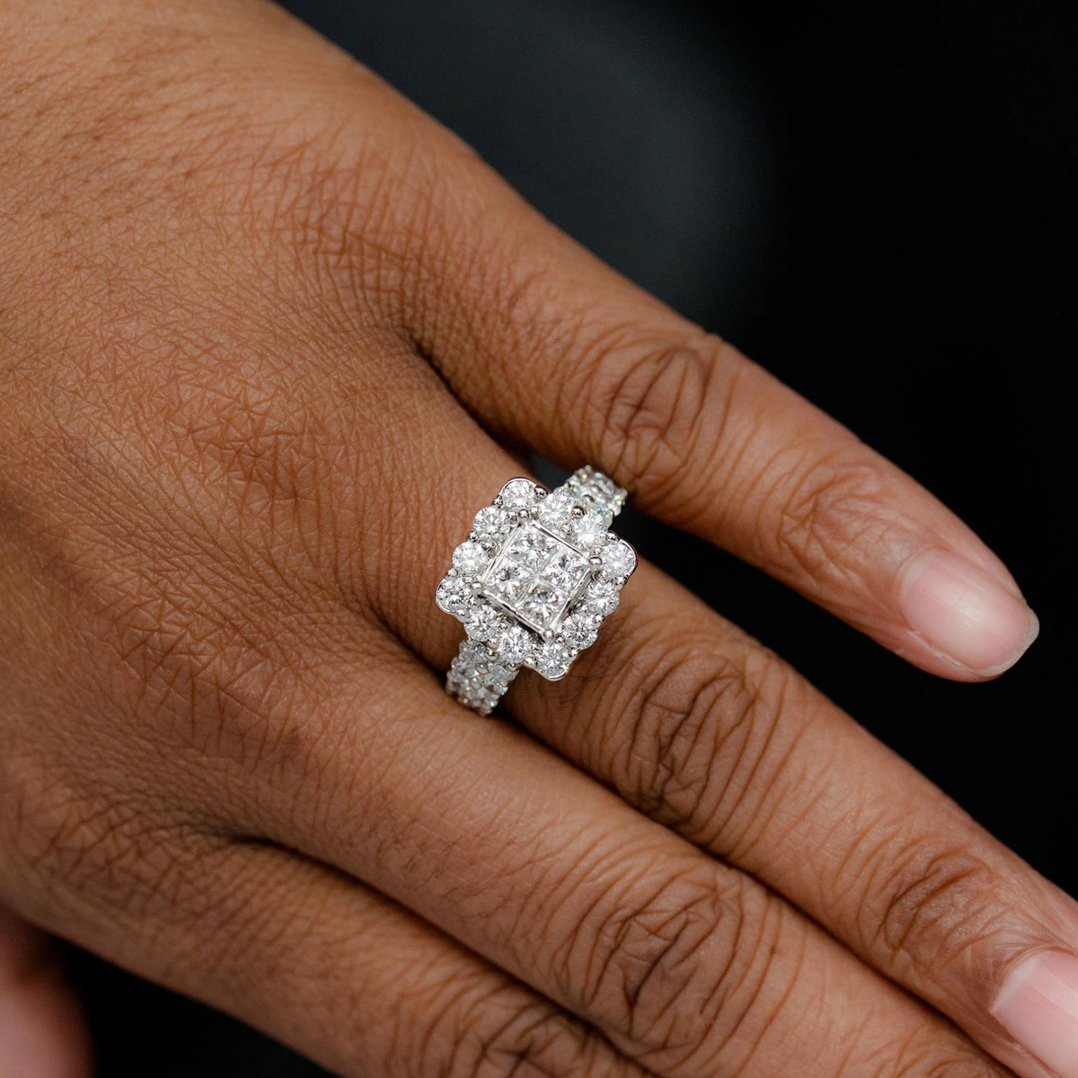 Princess quad pave halo ring hand