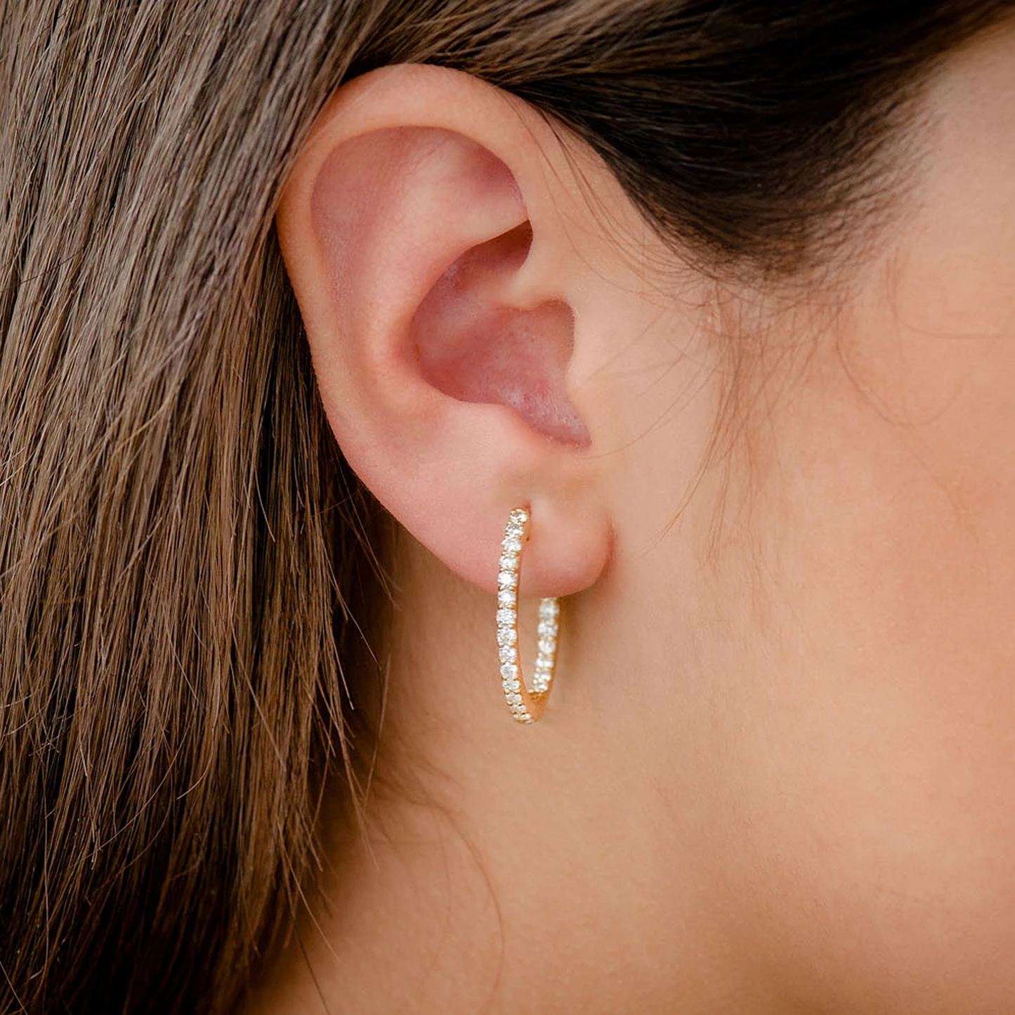 One Row Diamond Hoops in 14K yellow gold, worn view
