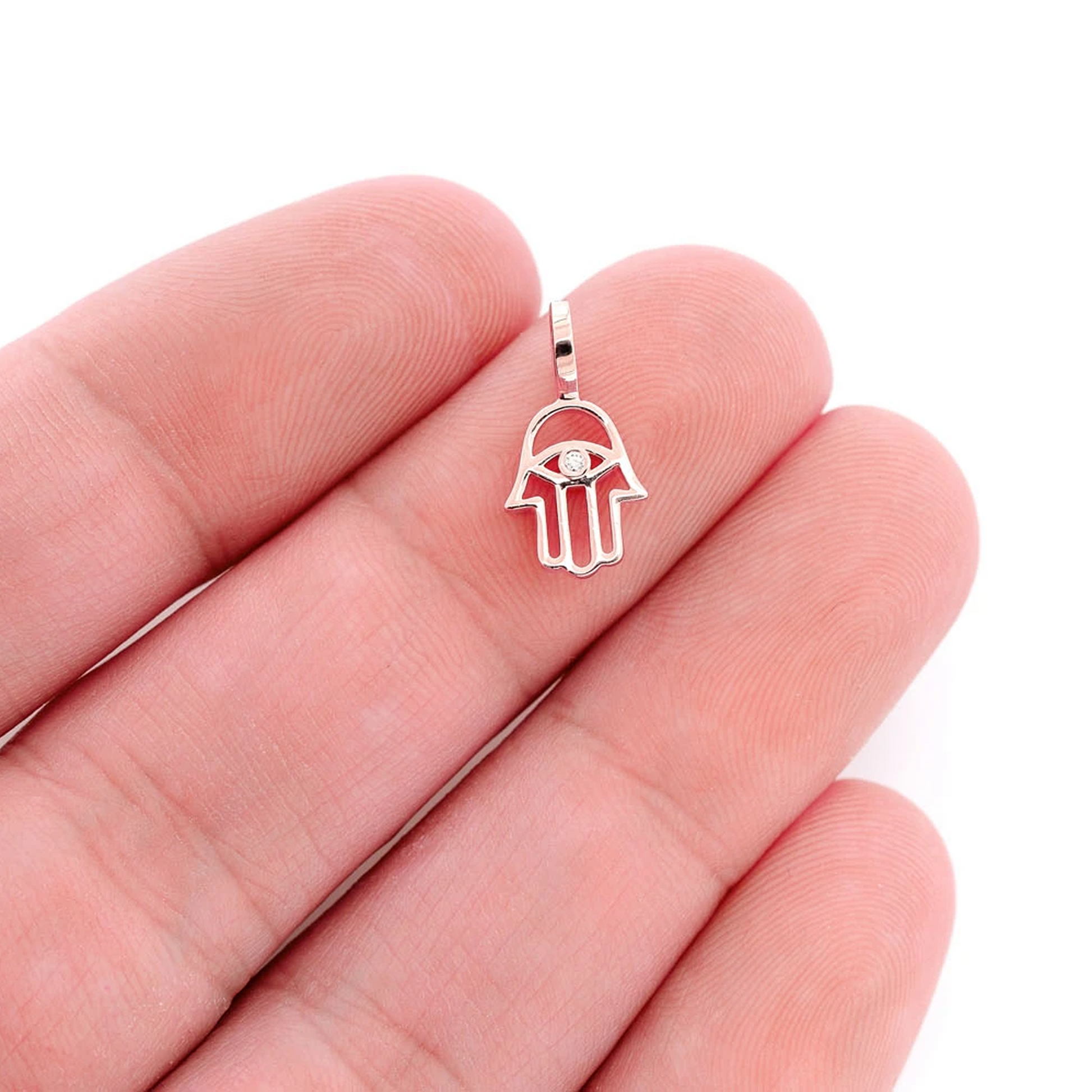 Open Hamsa Pendant in 14K rose gold, angled view