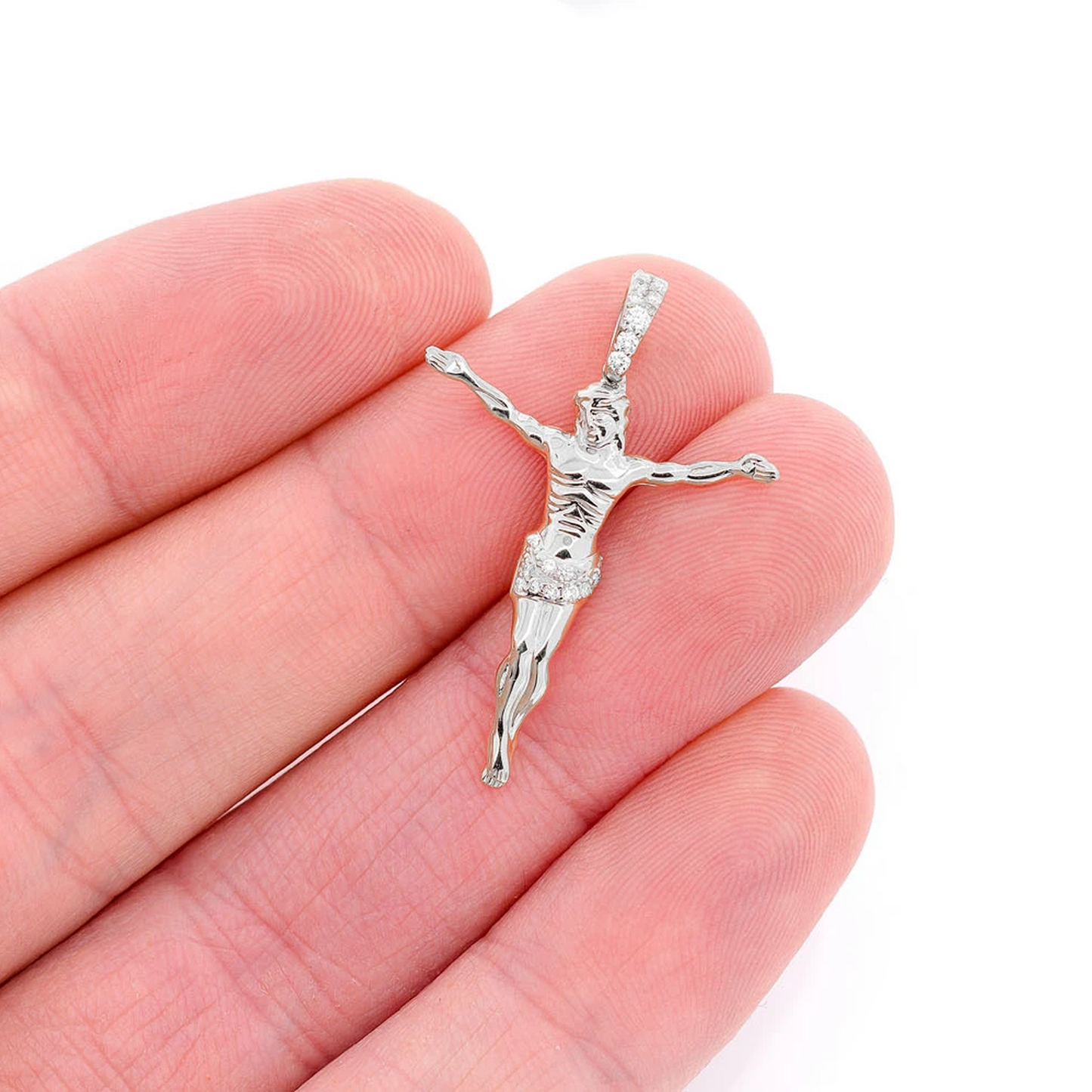 Jesus Crucifix Diamond Pendant in 14K white gold, Signature | 0.10ctw | Half-Diamond, angled view