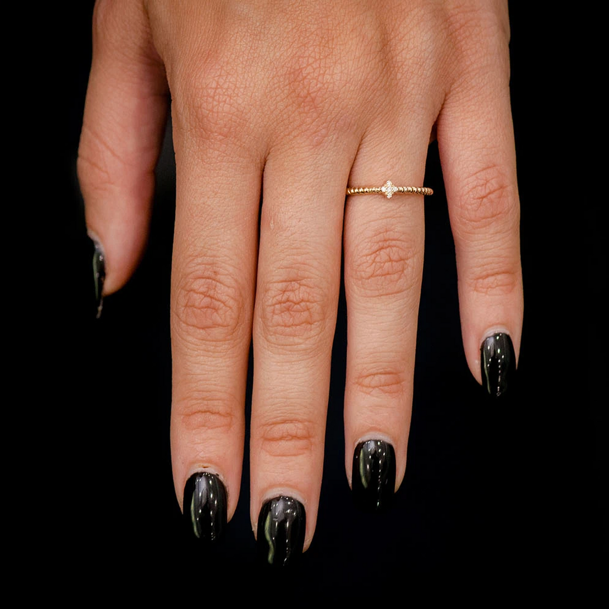 Five Stone Ring 14k in yellow gold, worn on hand